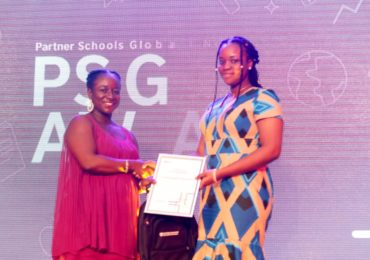 Principal of BIS celebrates with CHIOMA-Best student in Economics IGCSE